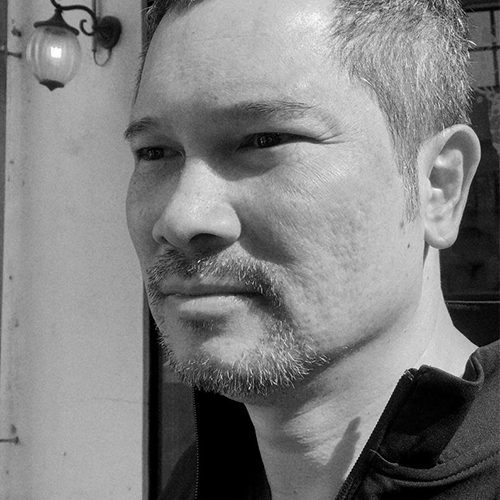 Black and white portrait of Lee Weng Choy, a Malaysian male with short dark hair and a spiky beard.jpg